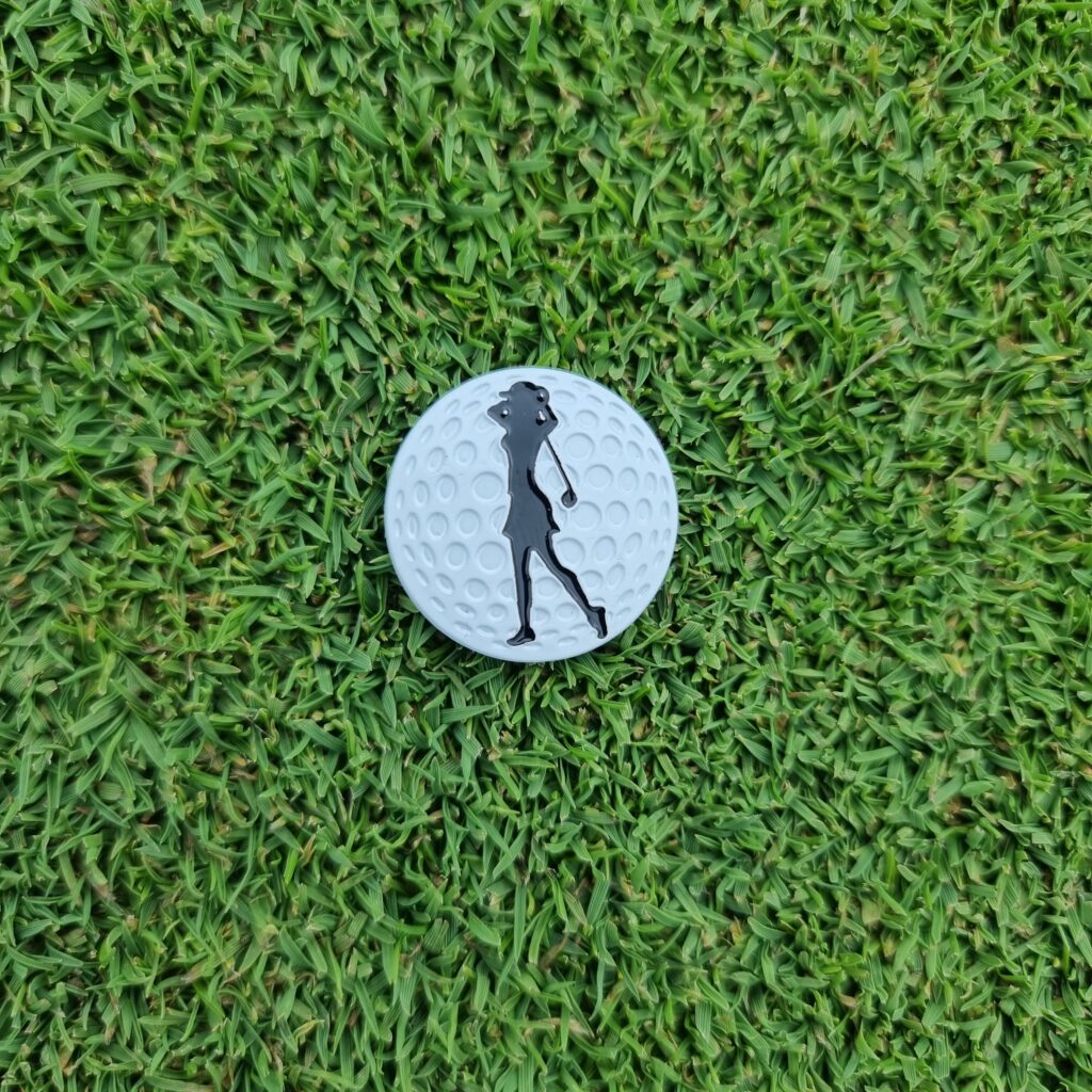 Golfmarkör med golftjej